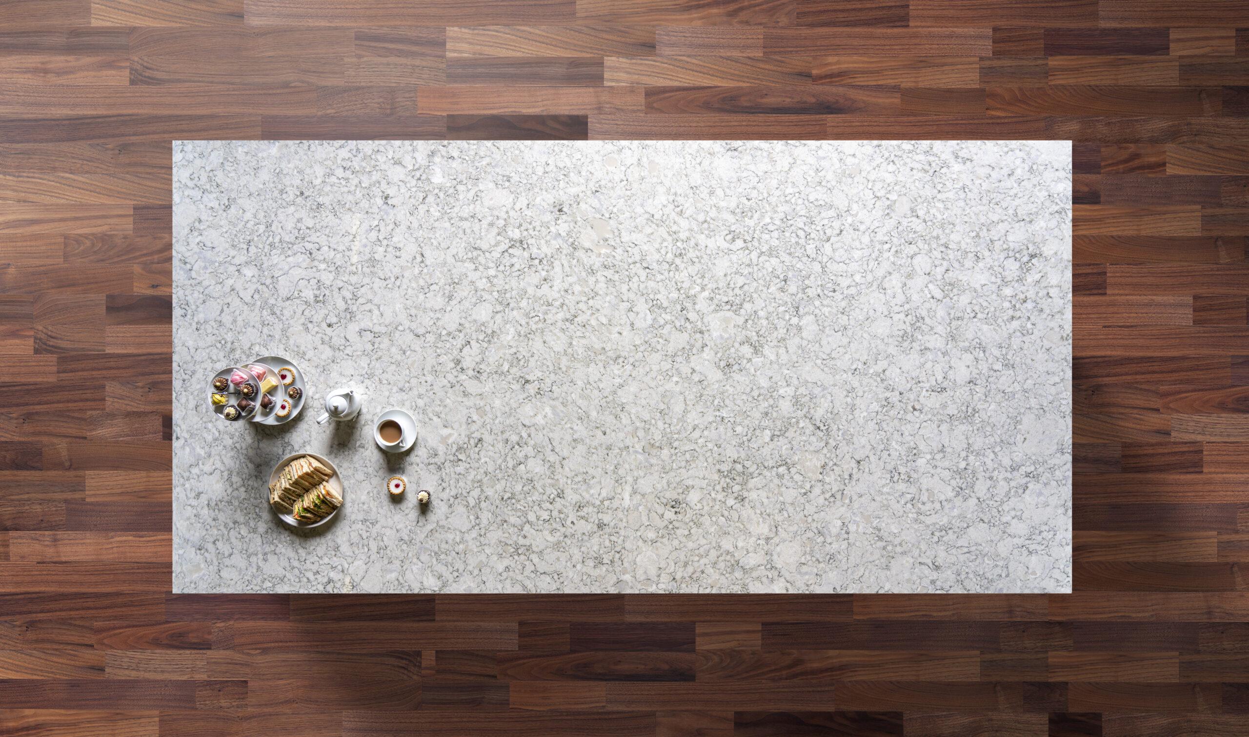 Overhead view of Berwyn Drift Quartz worktop showing grey marbled patterning across a large surface
