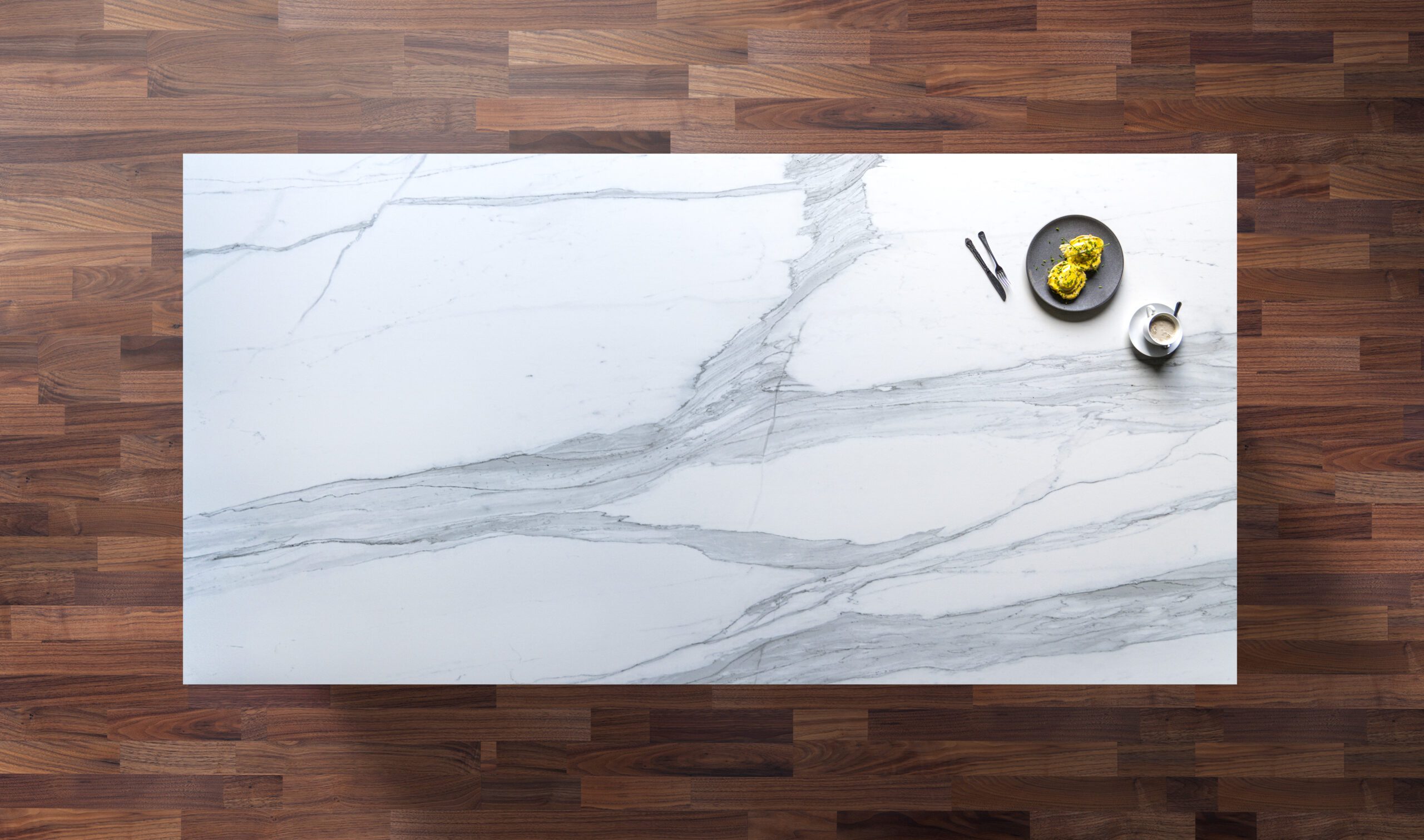 Bianco Lasa Porcelain worktop slab photographed from above, showing soft grey veining on a white background
