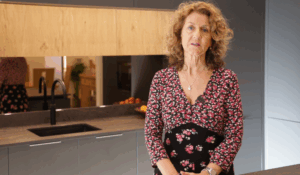 Customer giving a testimonial in her kitchen featuring Laurent Porcelain worktops