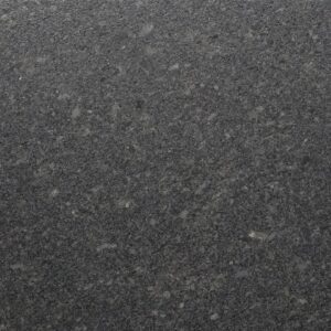 Close up slab photo of Steel Grey leather Granite showing fine speckling and a subtle textured finish across the dark grey surface.
