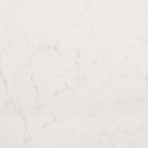 Close up of Carrara Quartz surface showing soft white background and light grey veining