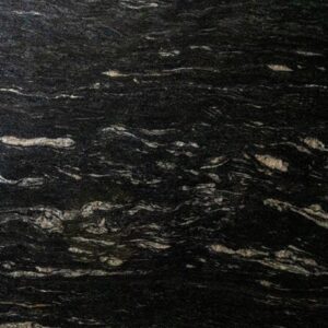 Close up slab photo of Cosmic Black Granite showing sweeping veining and layered mineral patterning through the dark surface.