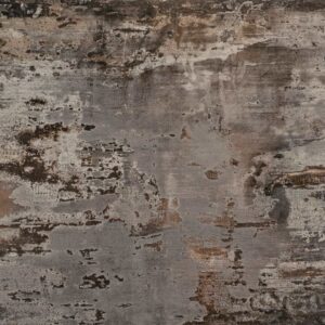 Trilium Porcelain surface close-up showing layered grey tones with warm rust-style markings and mottled movement