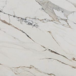 Macchia Antica Porcelain slab detail with sweeping gold and grey veining on a bright white background