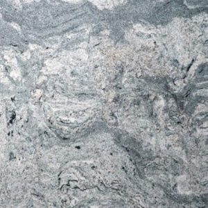 Close up slab photo of Viscount White Granite showing flowing grey veining and cloudy movement across a light stone background.