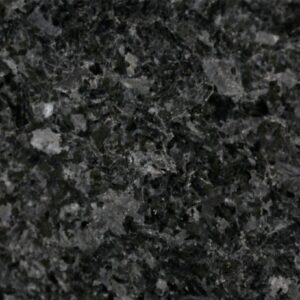 Close up slab photo of Angola Black Granite showing a dense dark crystal pattern with natural grey and black movement across the surface.