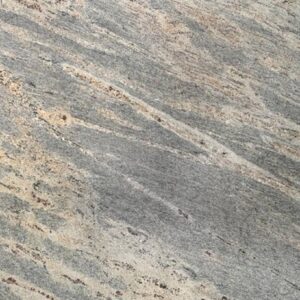 Close up slab photo of Kashmir White Granite showing soft grey movement with warm beige mineral flecks and gentle natural veining.