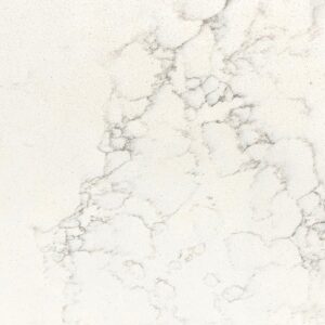 Close-up of Olympus White Quartz slab showing soft grey veining across a bright white surface