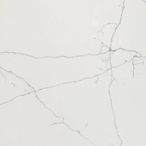 Close-up of White Macaubus Quartz showing fine grey veining across a bright white surface